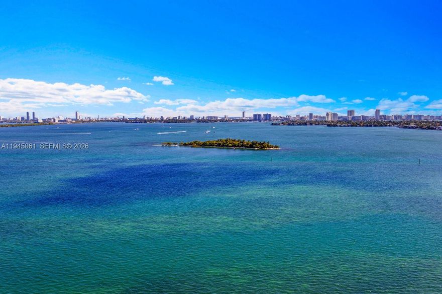 Waterfront penthouse loft with breathtaking sunrise views of the Ocean, Biscayne Bay, and Miami Beach. Features 1 bed / 1 bath, 12’ ceilings, floor-to-ceiling impact windows, extra-large balcony, and assigned covered parking. Boutique Kobi Karp–designed building with bayside pool, sunset terrace, bay-view gym, and 24-hour concierge/security. Prime location near Miami Beach, Brickell, Downtown, Wynwood, Design District, and MIA.