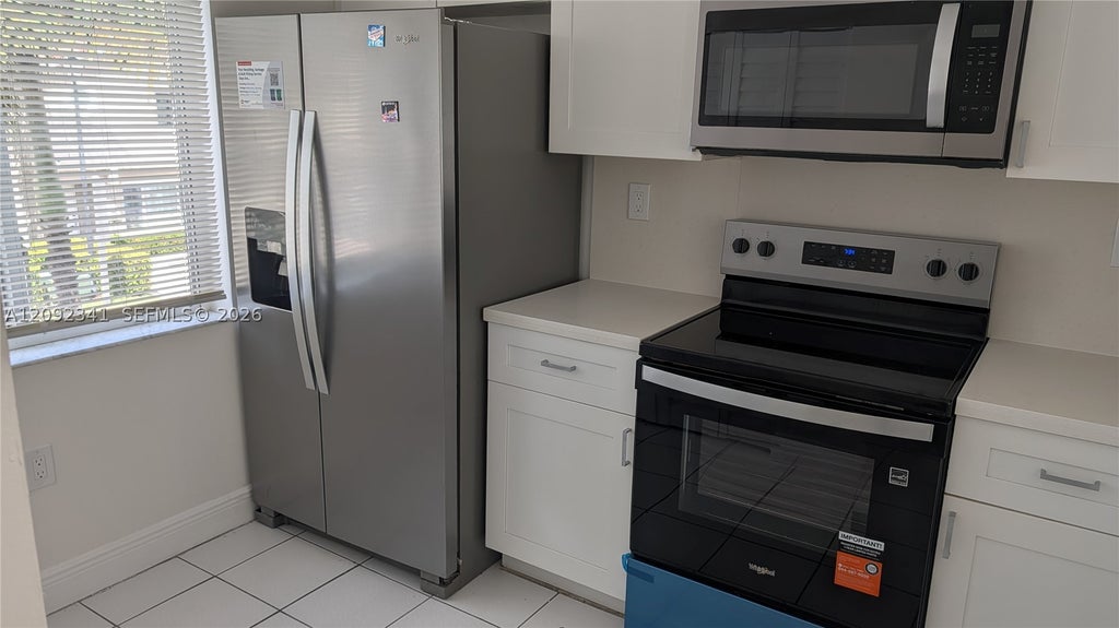 Photo of 208 Riviera Cir #67-10, Weston, FL 33326 (MLS # A12092341)