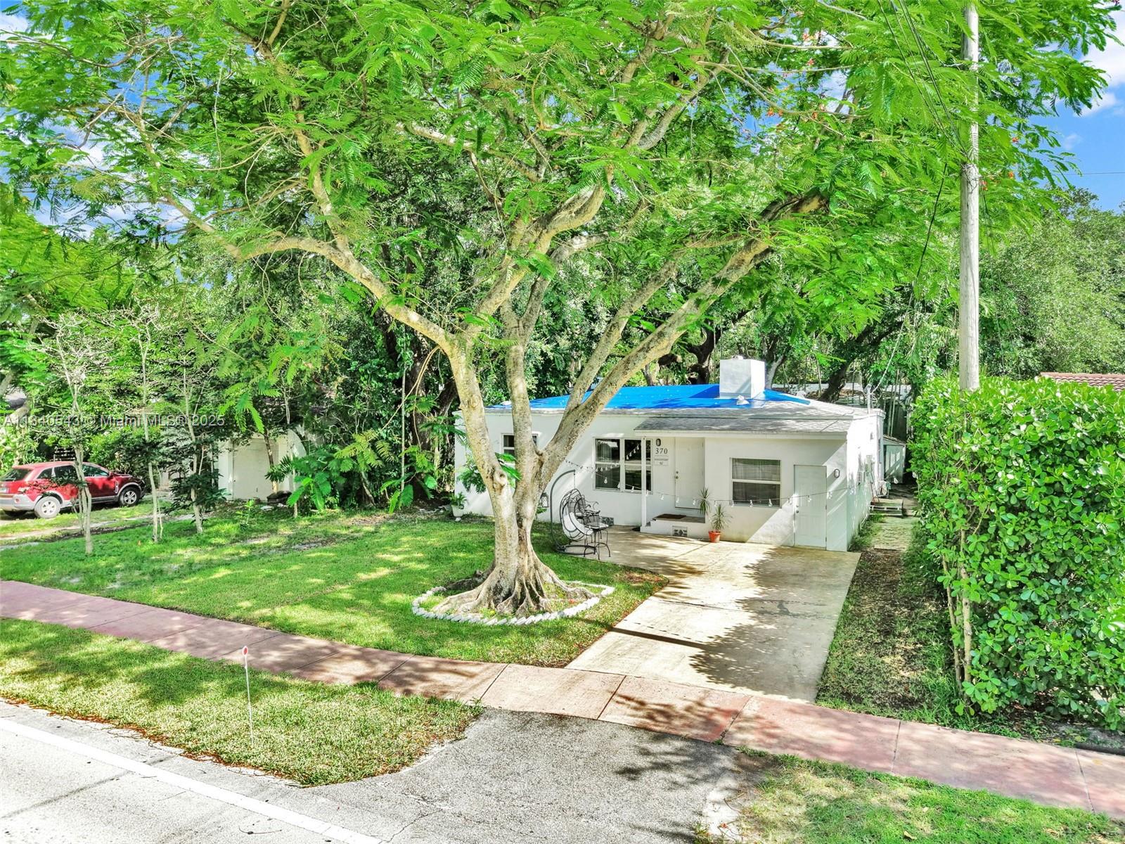 Discover this 4-bedroom, 2-bath home in the residential neighborhood of El Portal, Florida. With nearly 1,700 sq ft under roof and a 5,000 sq ft lot, it’s perfect for expanding or building. The roof has been recently renovated, and there’s ample space in the backyard to add a pool or an efficiency unit. Both side yards offer room to enlarge the home. El Portal also allows you to build a front-yard fence, making it easy to enjoy the front garden as a private green space. A great opportunity in a peaceful, tree-lined community.