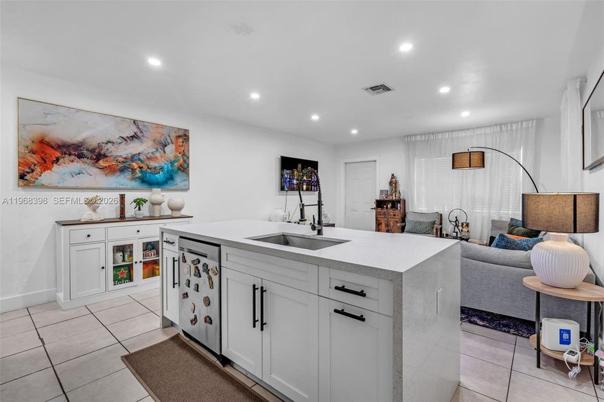 Exceptional opportunity in the heart of Miami! The main residence features 2 bedrooms and 1 bathroom with a beautifully remodeled kitchen showcasing modern finishes, updated cabinetry, and a functional layout. A standout feature of this property is the fully equipped 1-bedroom, 1 bathroom in-law quarters with its own full kitchen and private entrance, making it ideal for extended family, guests, or potential rental income. Property features a spacious backyard with ample room to entertain, expand, add a pool, or create your own private outdoor retreat. Conveniently located near major highways, shopping, dining, and just minutes from Miami International Airport and Downtown Miami.