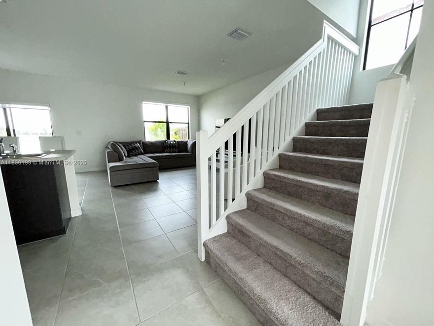 Spacious and well-maintained 3 bedroom, 2.5 bath corner townhouse with 1815 sq ft of living space in the sought-after Cutler Bay community. Open floor plan with natural light throughout. Modern kitchen features stainless steel appliances. Master bedroom includes walk-in closet and en-suite bath. In-unit washer and dryer. Enjoy relaxing lake view from the master bedroom and the backyard. Corner unit offers extra privacy and green space. Low HOA. Located near parks, shopping, schools, and major highways.