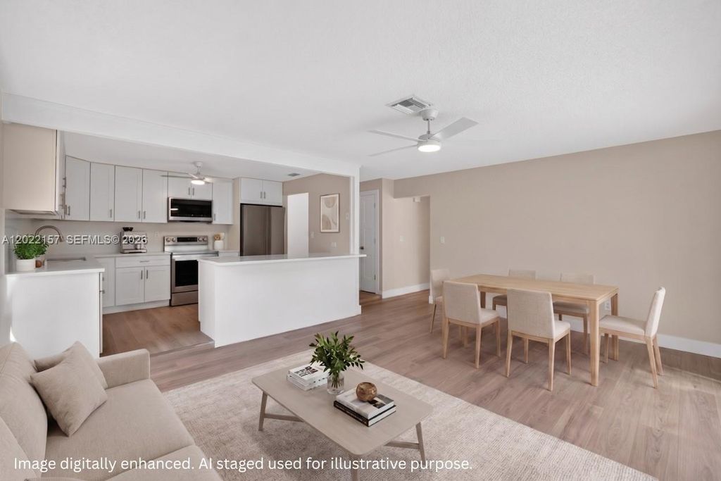 Photo of 1660 NW 94th Ave, Plantation, FL 33322 (MLS # A12022157)