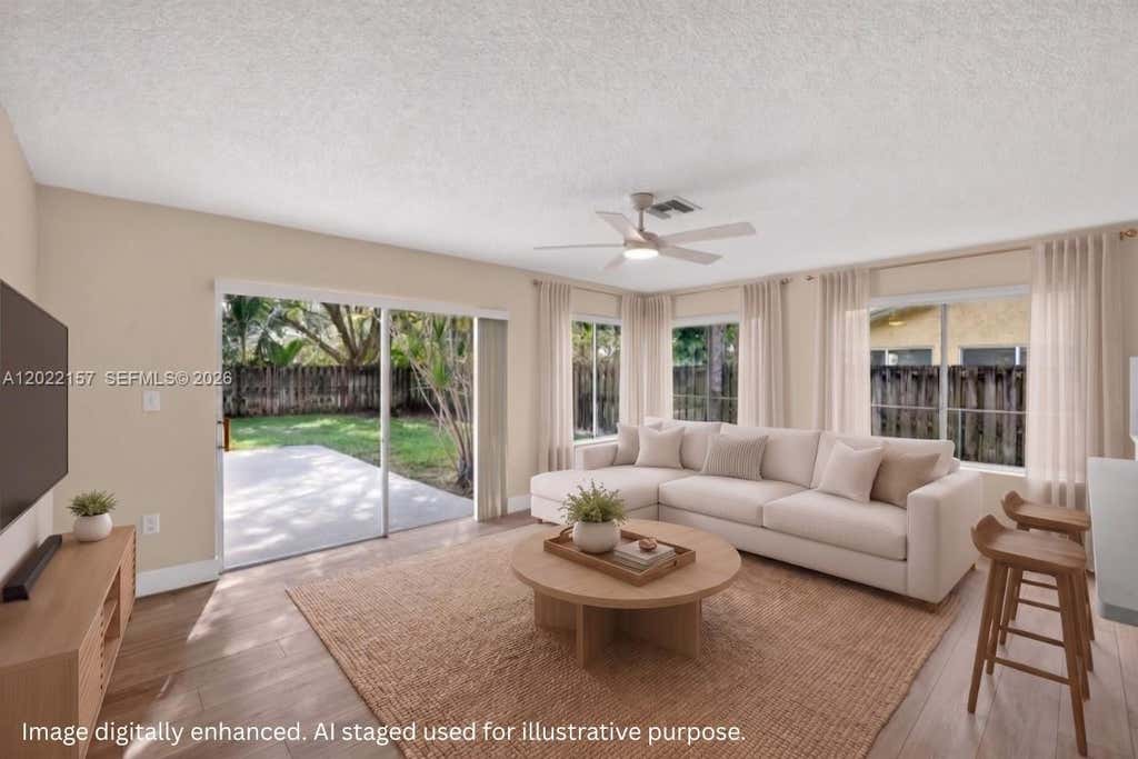 Photo of 1660 NW 94th Ave, Plantation, FL 33322 (MLS # A12022157)
