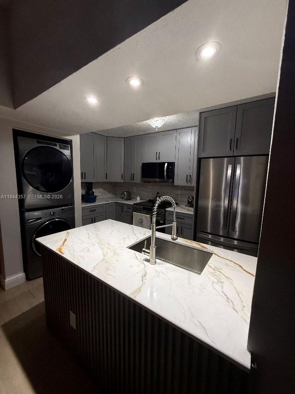 Photo of 8019 NW 15th Mnr #8019, Plantation, FL 33322 (MLS # A11944357)