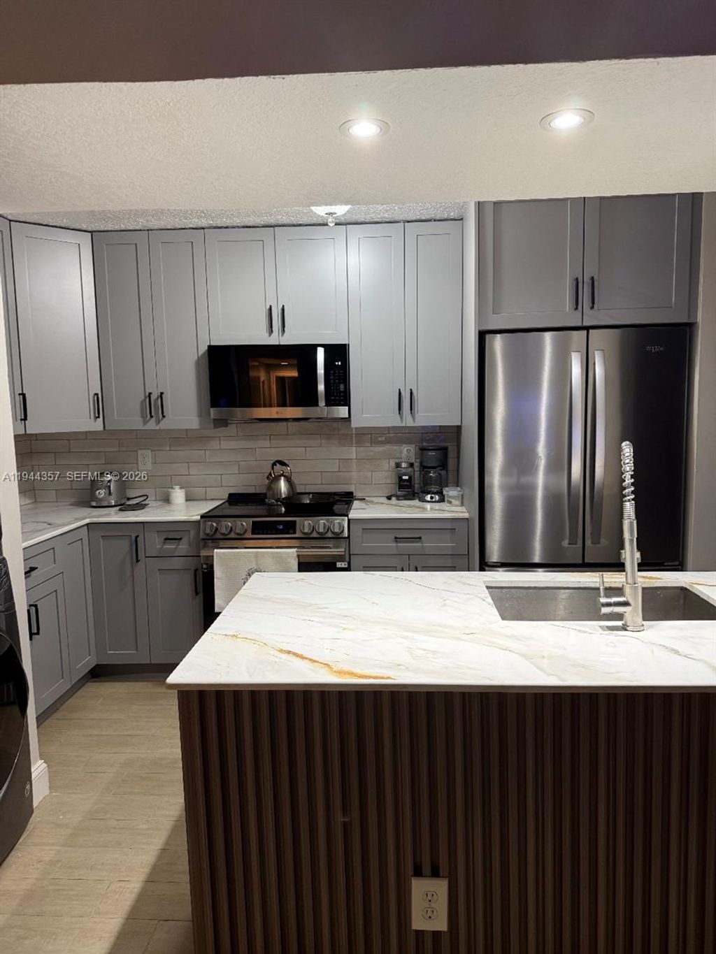 Photo of 8019 NW 15th Mnr #8019, Plantation, FL 33322 (MLS # A11944357)