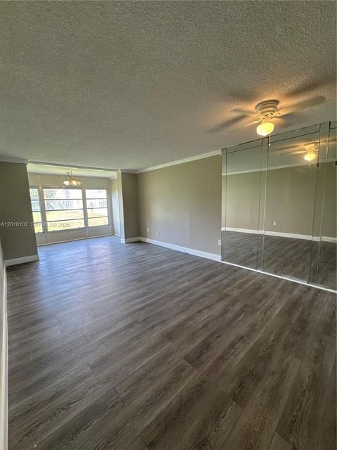 Photo of 8060 N Sunrise Lakes Dr #105, Sunrise, FL 33322 (MLS # A12018102)