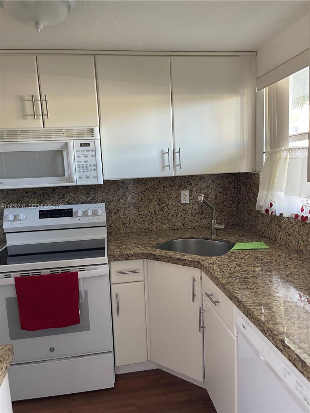 Photo of 8515 Sunrise Lakes Blvd #103, Sunrise, FL 33322 (MLS # A11950741)