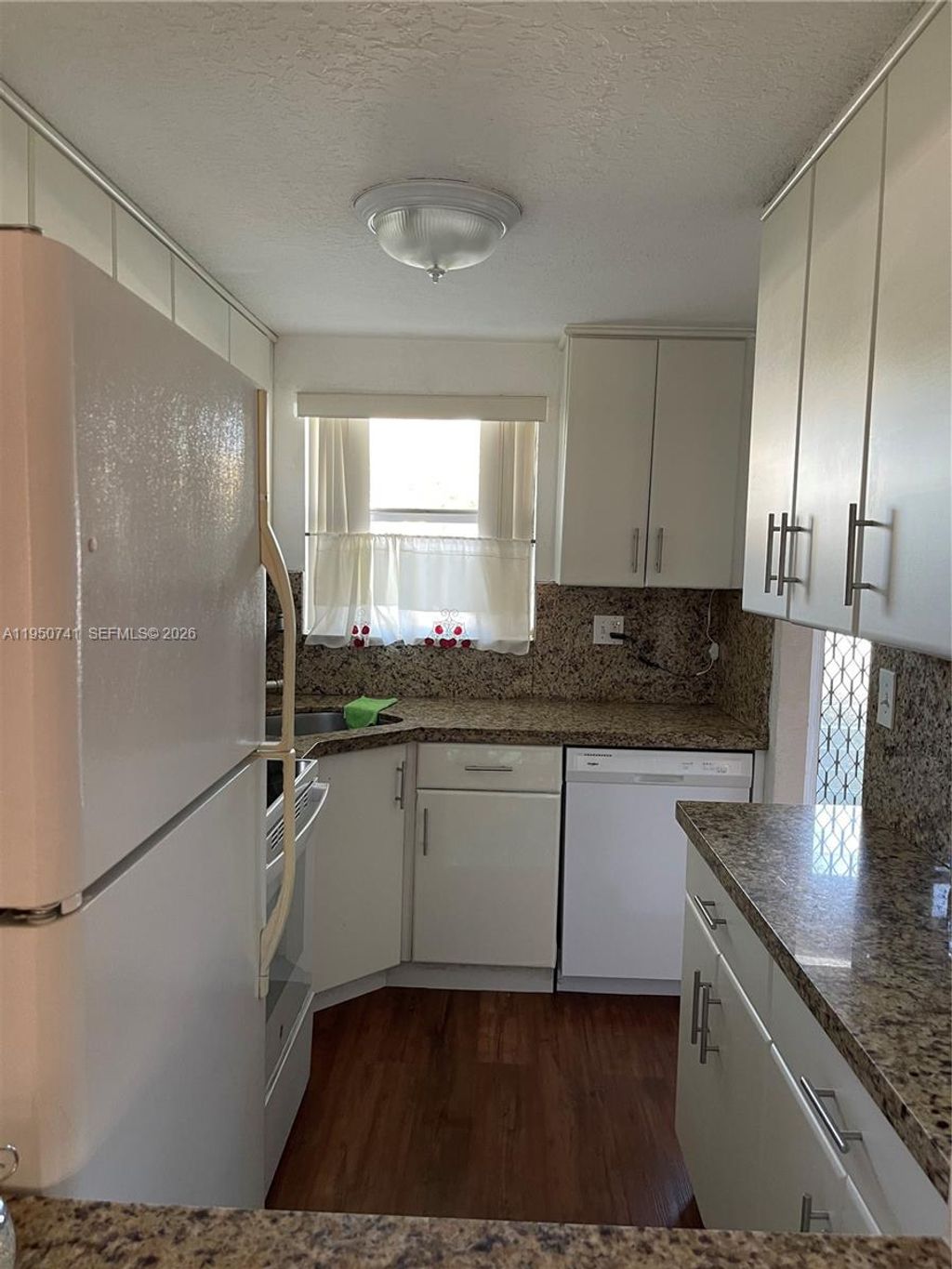 Photo of 8515 Sunrise Lakes Blvd #103, Sunrise, FL 33322 (MLS # A11950741)