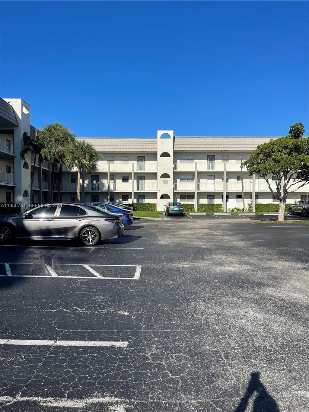 Photo of 8515 Sunrise Lakes Blvd #103, Sunrise, FL 33322 (MLS # A11950741)