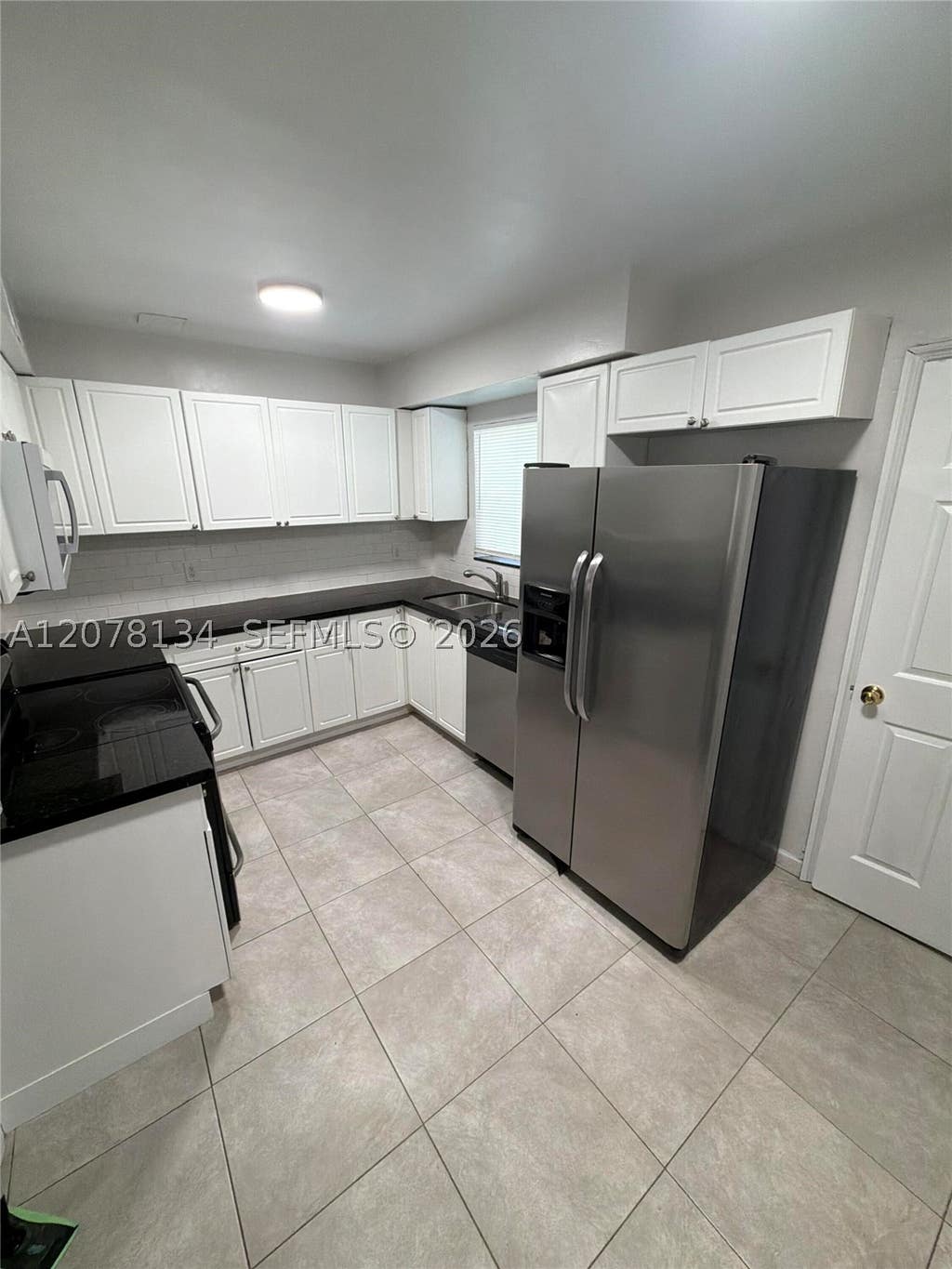 Photo of 942 NW 11th Ct, Fort Lauderdale, FL 33311 (MLS # A12078134)