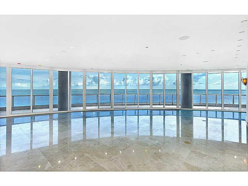 Breathtaking panoramic ocean view from floor to ceiling windows welcome you to this 2,959 SF home in the sky. Wahab construction & award-winning architect meticulously designed this apartment. Enjoy the custom kitchen w/ wood trim, black granite counterto ps & Miele appliances. This 3BD/3BA unit boasts a Crestron system & six zone Sonos based sound system all operated wirelessly. Sophisticated LED lighting accentuates the exquisite finishes & marble flooring throughout. Direct ocean views from every BD.