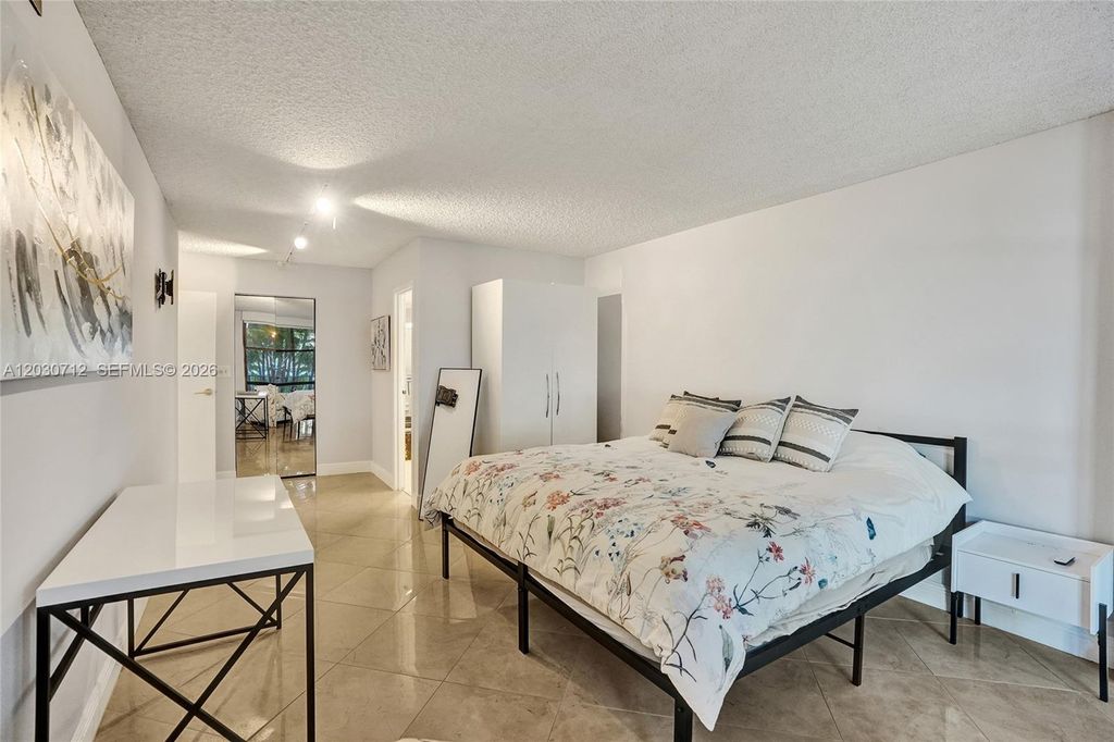 Photo of 1000 Parkview Dr #104, Hallandale Beach, FL 33009 (MLS # A12030712)