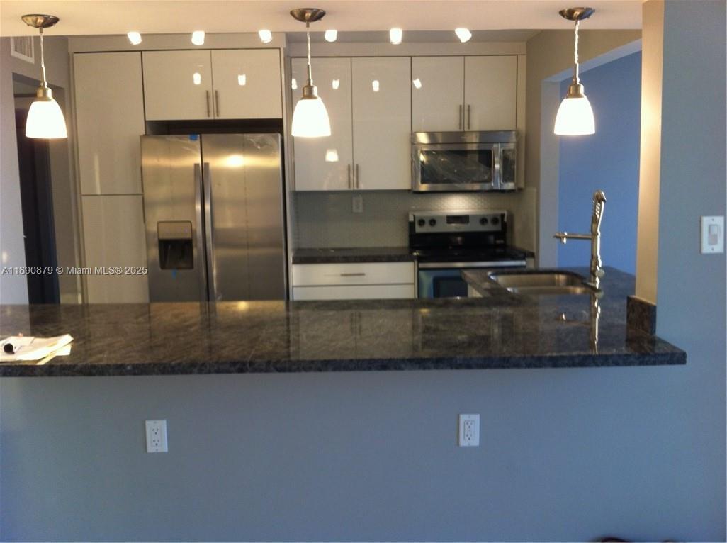 Quiet corner on the water close to Aventura and the Beach. This renovated gem won't last. Large apartment with custom cabinets throughout tastefully decorated with amazing water views. Rent includes basic cable and internet service, 24 hour guard gated community with tennis, gym, sauna, pool and BBQ areas overlooking the water.