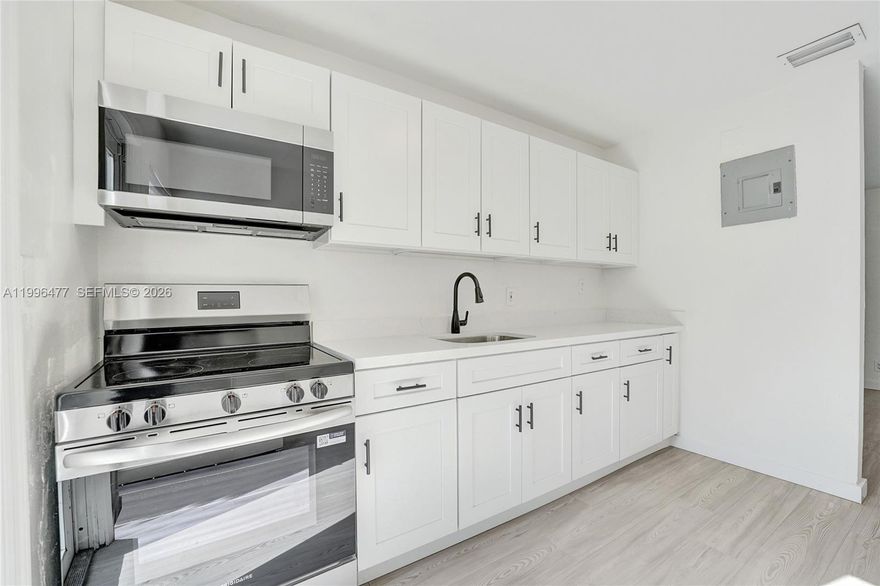 Welcome to this beautifully updated home in the heart of Fort Lauderdale. This move-in-ready 3/2 property features hurricane impact windows and doors, offering both peace of mind and energy efficiency.

Step inside to a beautifully renovated interior with white shaker kitchen cabinetry with quartz countertops, complemented by stainless steel appliances. Throughout the home, you'll find new laminate wood flooring, creating a clean and cohesive look.

Additional upgrades include a brand-new washer and dryer, to be installed by the seller prior -closing.

Minutes to Downtown Fort Lauderdale / Las Olas. Close to Wilton Manors dining & nightlife. Short drive to Fort Lauderdale Beach. Easy access to major highways & airport. Perfect for homeowners or investors seeking a turnkey property in a rapidly growing area.