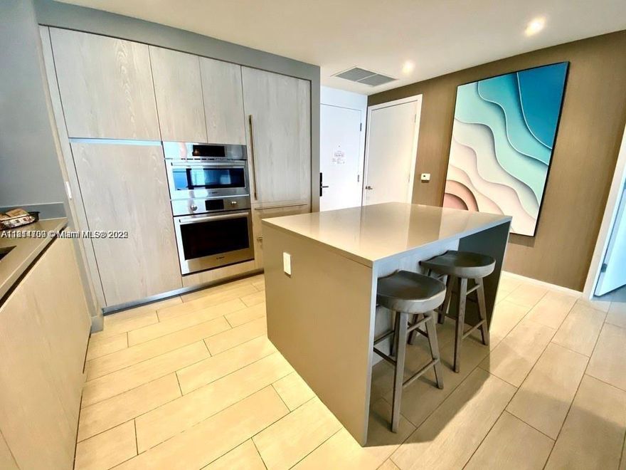 2 bedroom 2 bath condo hotel with amazing ocean views from all rooms and large balcony and flexible rental options this spacious and bright unit with all included tasteful furniture and appliances makes for a desirable investment property and vacation home. Proximity to airports and highways gives it desired easy access.