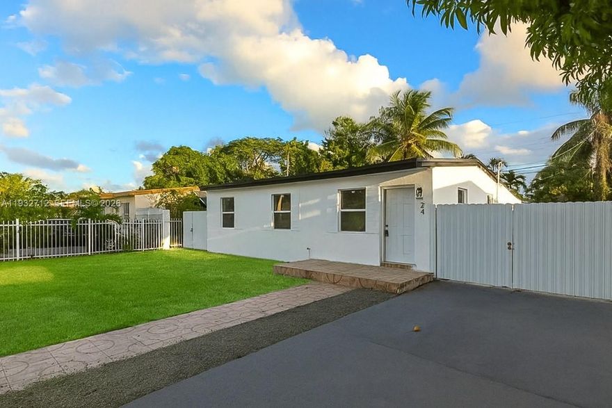 Step into this beautifully fully remodeled 4-bedroom, 3-bath single-family home where modern design meets everyday comfort. Thoughtfully updated from top to bottom, this home features spacious living areas, stylish finishes, and a seamless layout perfect for both relaxing and entertaining. The fully fenced backyard offers a private outdoor retreat—ideal for gatherings, pets, or simply unwinding. Conveniently located near major highways and Hard Rock Stadium, this move-in-ready home combines comfort, style, and accessibility in one exceptional package.