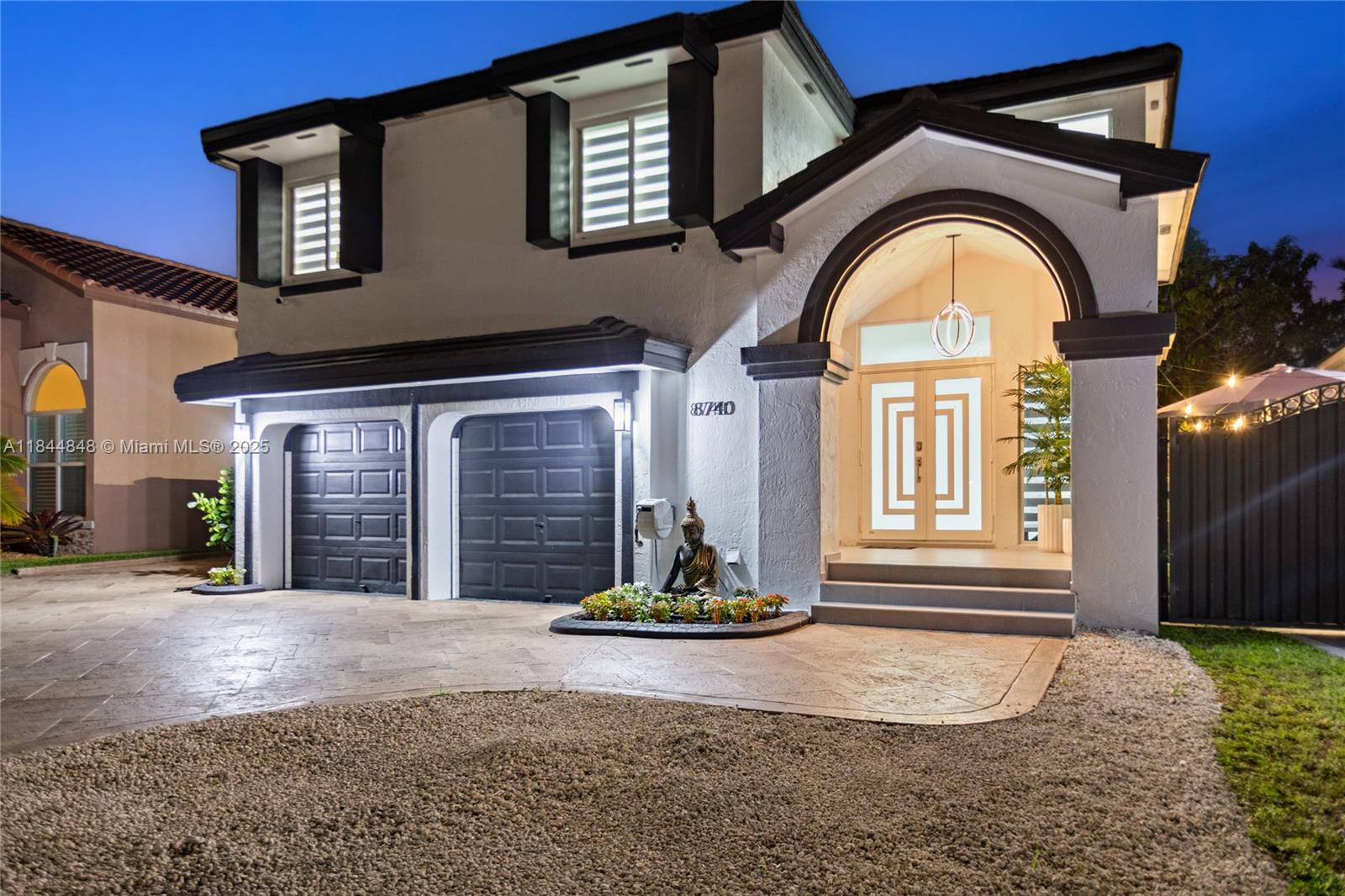Discover one of the finest homes in Miami Lakes! This fully renovated, move-in ready 2-story showplace offers 3,007 sq. ft. of refined luxury—featuring 5 bedrooms (one ideal as a private in-law suite or income-producing space), 3.5 bathrooms, walk-in closets, indoor laundry, and no HOA. The master suite offers a spa-inspired bathroom with a soaking tub and frameless glass shower. Throughout the home, you’ll find a new roof, impact windows,Calacatta full slabs, a floating glass-railed staircase, and modern glass doors on all bathrooms and closets. The gourmet kitchen opens to an entertainer’s dream backyard—complete with a heated pool, ambient night lighting, lush landscaping, and outdoor kitchen. This home has been thoughtfully upgraded for elegance, comfort, and modern lifestyle.