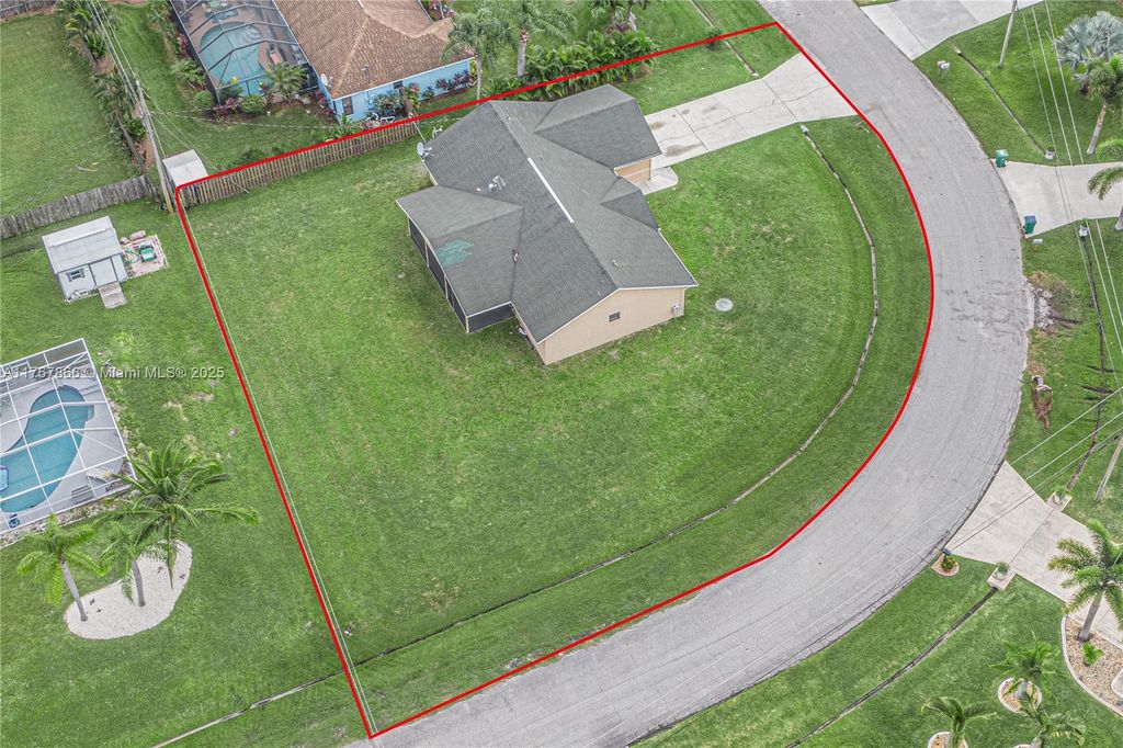 Photo of 5629 NW Commodore Ter, Port Saint Lucie, FL 34983 (MLS # A11767866)