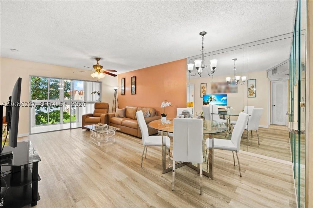 Photo of 2911 N Pine Island Rd #311, Sunrise, FL 33322 (MLS # A12066227)