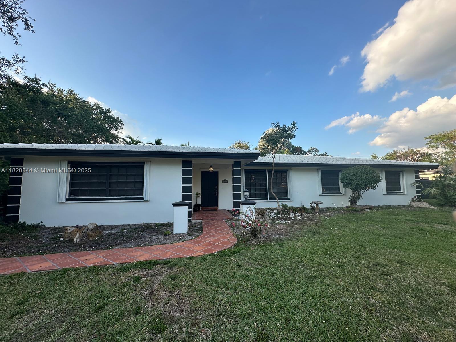 Remodeled 3-bedroom, 2-bath home on over 16,000 sq ft lot in Palmetto Bay. Features include a fully screened patio, safety pool fence, remote-control ceiling fans throughout the home and patio, and tiled outdoor space. Rent includes landscaping, pool service, and A/C maintenance. Excellent location with easy access to schools, parks, and main roads.