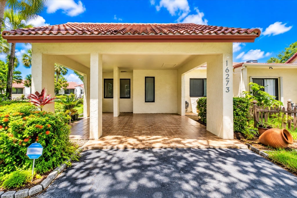 Photo of 16273 Laurel Dr #7, Weston, FL 33326 (MLS # A12095151)