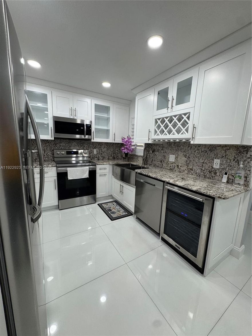 Impeccably remodeled 3/2 on 1st floor. Where every detail has been thoughtfully upgraded. From the Kitchen with brand new appliances stainless steel to the elegant flooring and designer finishes throughout. Freshly painted & cleaned, large screened patio. Elegant remodeled bathrooms with new vanity's. Electrical and Plumbing uprated . Split bedroom floor plan. . RESORT STYLE WELL MAINTAINED COMMUNITY, A RATED SCHOOLS. LOTS OF AMENITIES in both Karanda as well as the township facilities : POOL, SPA, TENNIS,FITNESS CENTER. MAJOR HIGHWAYS, SHOPPING, RESTAURANTS, ENTERTAINMENT. INVESTORS WELCOME.