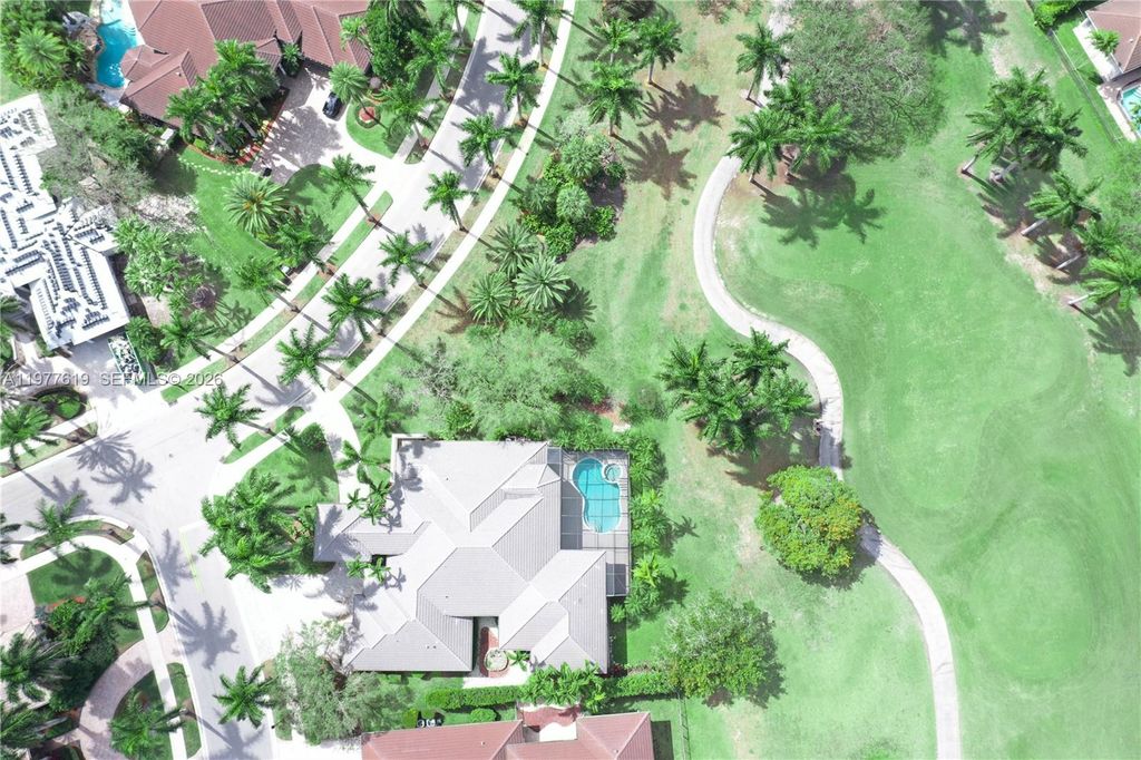 Photo of 2418 Poinciana Ct, Weston, FL 33327 (MLS # A11977619)