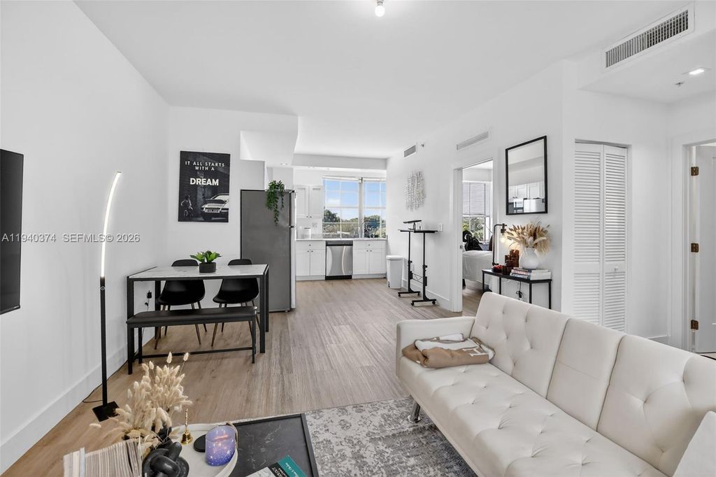 Photo of 4100 SW 64th Ave #301, Davie, FL 33314 (MLS # A11940374)