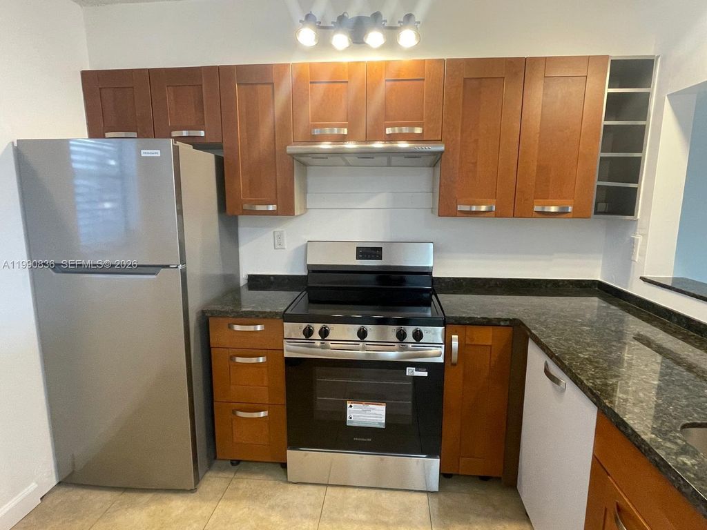 Photo of 3410 Foxcroft Rd #213, Miramar, FL 33025 (MLS # A11990836)