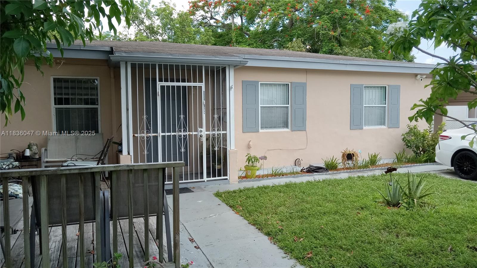This beautiful 3-bds offers 1bth with a spa-like shower and an elegant pedestal sink. Large 1-1 complete with a new mini-split A/C and built-in closet, is ideal for visitors (non-permitted). With wooden blinds, two renovated showers, and 8 ceiling fans, this home offers comfort, promotes energy efficiency. Enjoy the benefits of a brand-new central A/C unit, water heater, less than 1 year old. The open floor plan connects the living rm, dining area, and kitchen, which boasts sleek countertops and a top-of-the-line stainless steel Schott smart flat-top stove, a built-in microwave, Fridge, and 2 pantries.
Step down in Laundry Room
Tropical oasis in Opa Locka, this home has fruit trees, star fruit, mangoes, avocados
The backyard is perfect for barbeque.