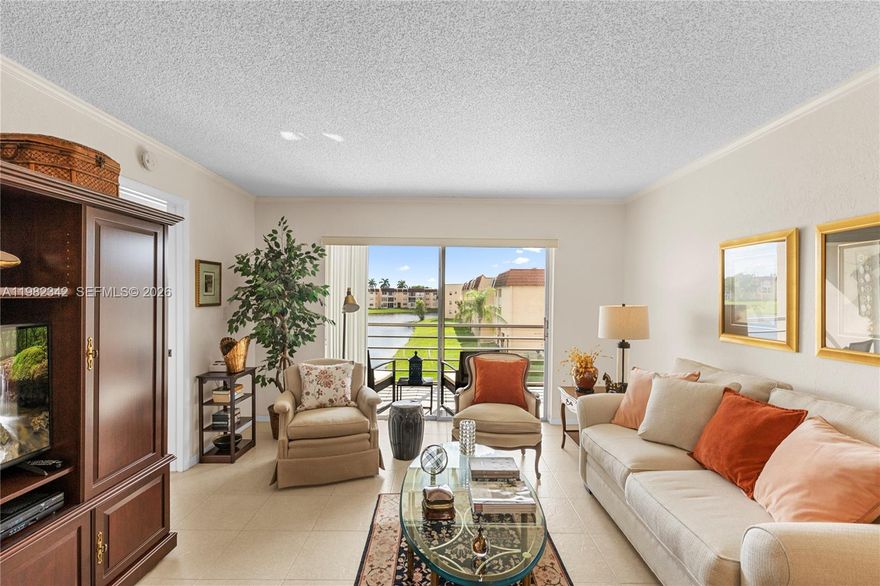 This beautifully kept 2-bedroom, 2-bath condo offers peaceful lake views from your private screened-in porch—perfect for relaxing or entertaining. The unit has been meticulously maintained and features a bright, open layout with a spacious living area, tile flooring, and plenty of natural light. The primary suite includes a walk-in closet and an en-suite bath for added comfort. Enjoy the tranquil lifestyle in Sunrise Lakes, a well-established 55+ community offering resort-style amenities including pools, clubhouse, fitness center, tennis, and a courtesy shuttle. Conveniently located near shopping, dining, and major highways.