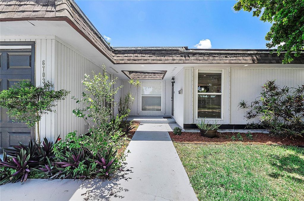 Photo of 6703 Brookwood Blvd, Tamarac, FL 33321 (MLS # A11841541)