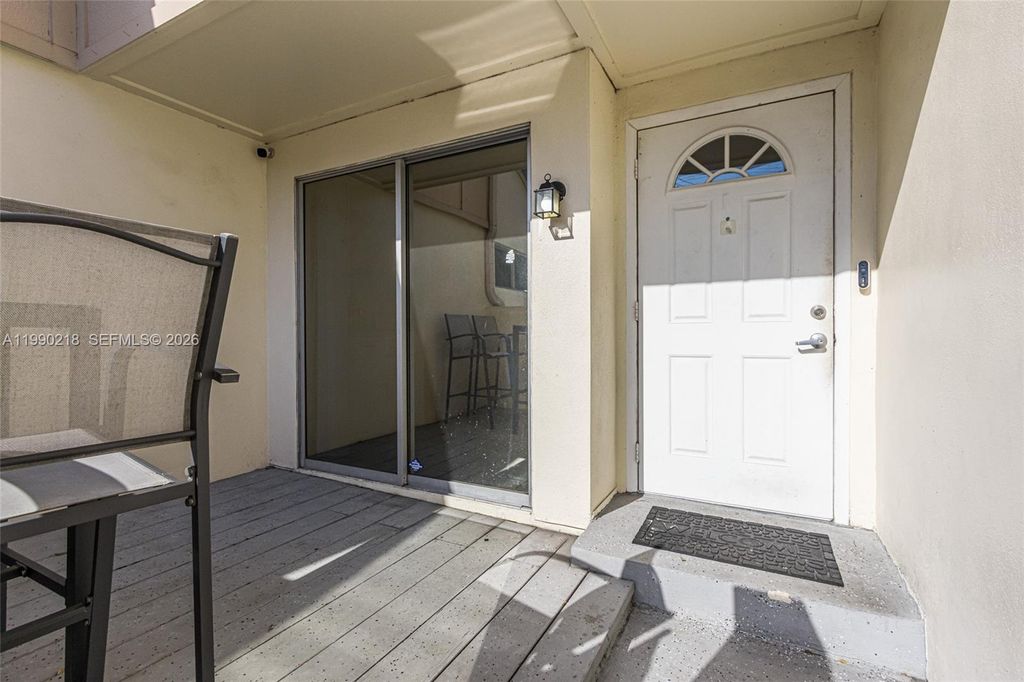 Photo of 835 NW 80th Ter #11, Plantation, FL 33324 (MLS # A11990218)