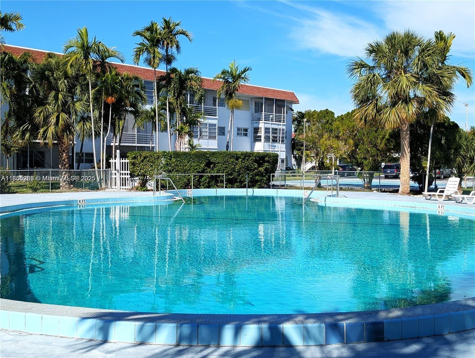 Peaceful 55+ Community Condo Experience quiet living in this charming second-floor condo, nestled in a tranquil 55+ community. Enjoy relaxing canal views from the screened-in balcony. This spacious unit features a large bedroom with a walk-in closet, expansive living and dining areas, and ample storage throughout. Recent updates include a newer central A/C (2023) and a new electric range, offering comfort and efficiency. The building is equipped with an elevator and convenient laundry facilities on every floor. Centrally located just minutes from major highways, shopping, dining, and the beach—this condo offers both serenity and accessibility.