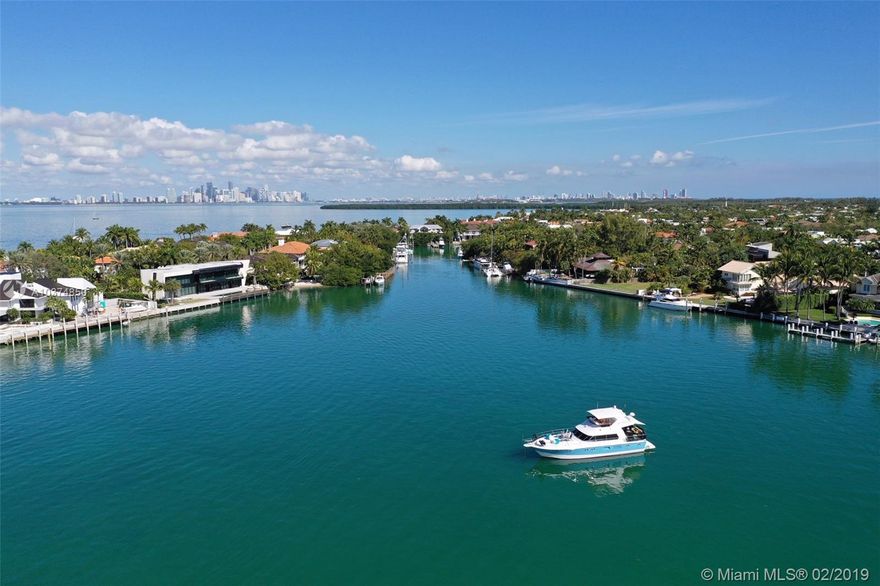 A very special waterfront home (105 waterfront feet) located in protected Hurricane Harbor, with large dock that takes your boat directly into Biscayne Bay with no bridges. Beautiful pool area surrounded by trees for privacy. Short quiet street, Wood floors and open concept with vaulted ceilings. Fireplace. Split bedrooms. 2 car garage.