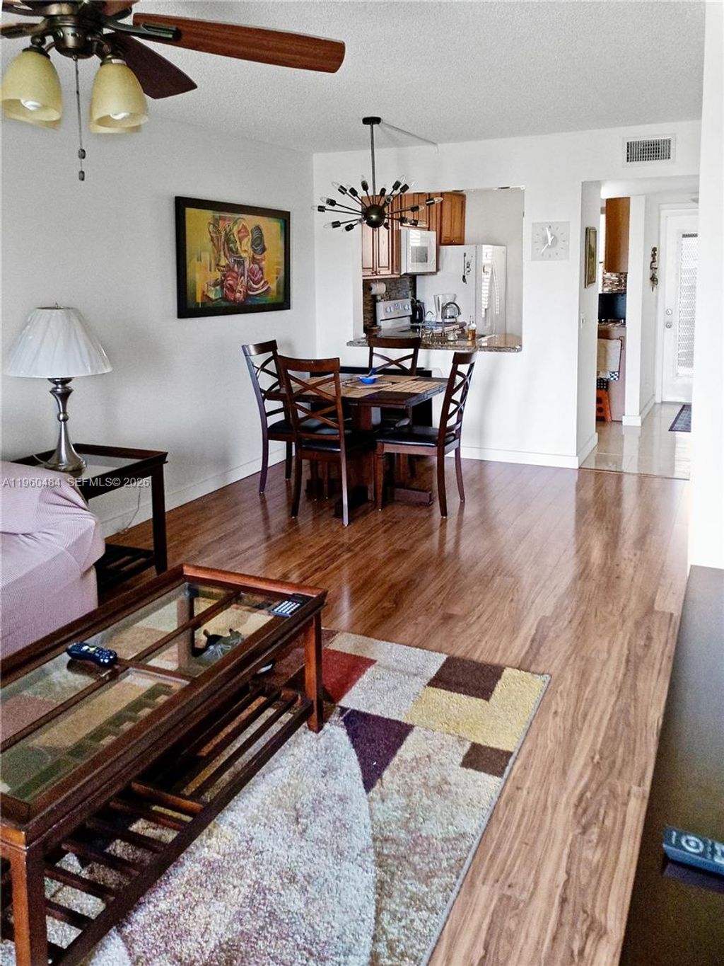 Photo of 10402 Sunrise Lakes Blvd #201, Sunrise, FL 33322 (MLS # A11960484)