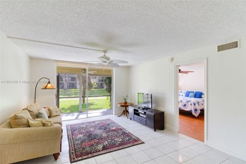 Photo of 400 S Hollybrook Dr #109, Pembroke Pines, FL 33025 (MLS # A11834168)