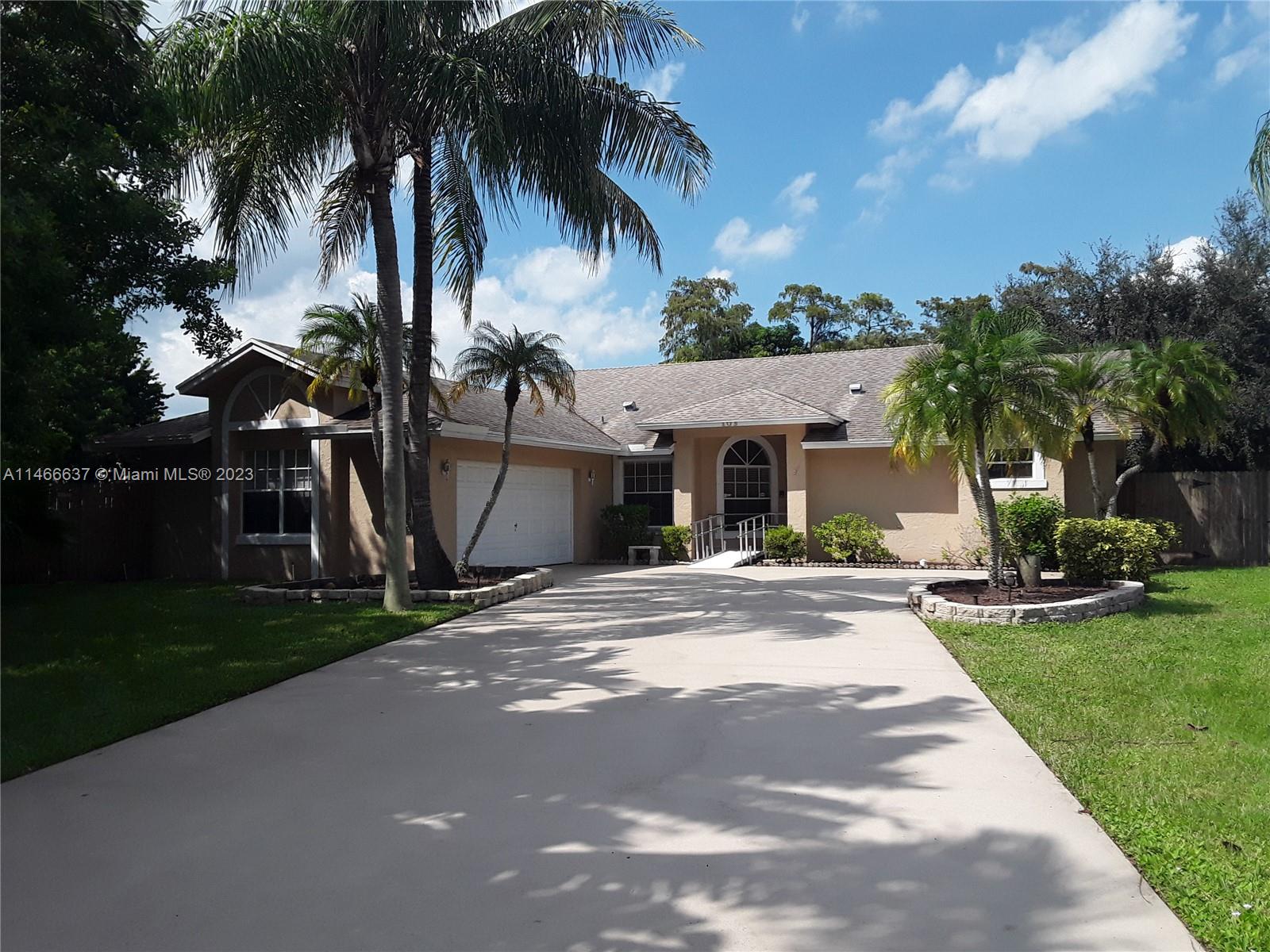 Property for Sale at 103 Oxford Ct Ct, Royal Palm Beach, Palm Beach County, Florida - Bedrooms: 3 
Bathrooms: 2  - $639,900