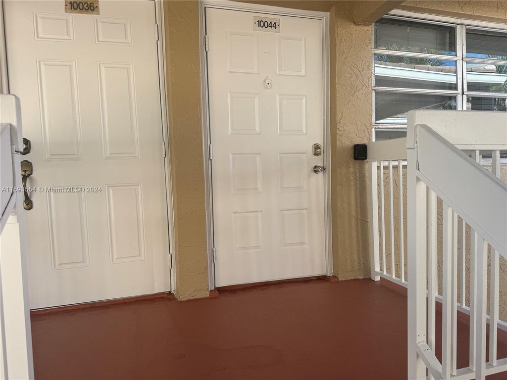 Photo of 10044 Twin Lakes Dr #37-E, Coral Springs, FL 33071 (MLS # A11593554)