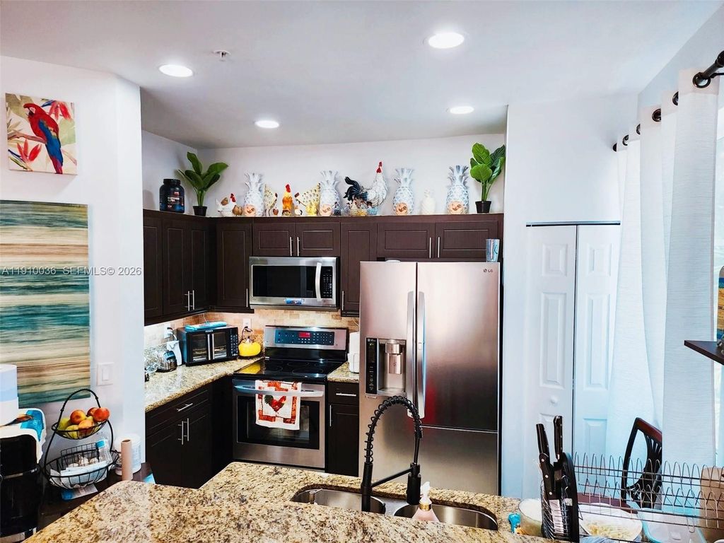 Photo of 12430 SW 50th St #147, Miramar, FL 33027 (MLS # A11910036)