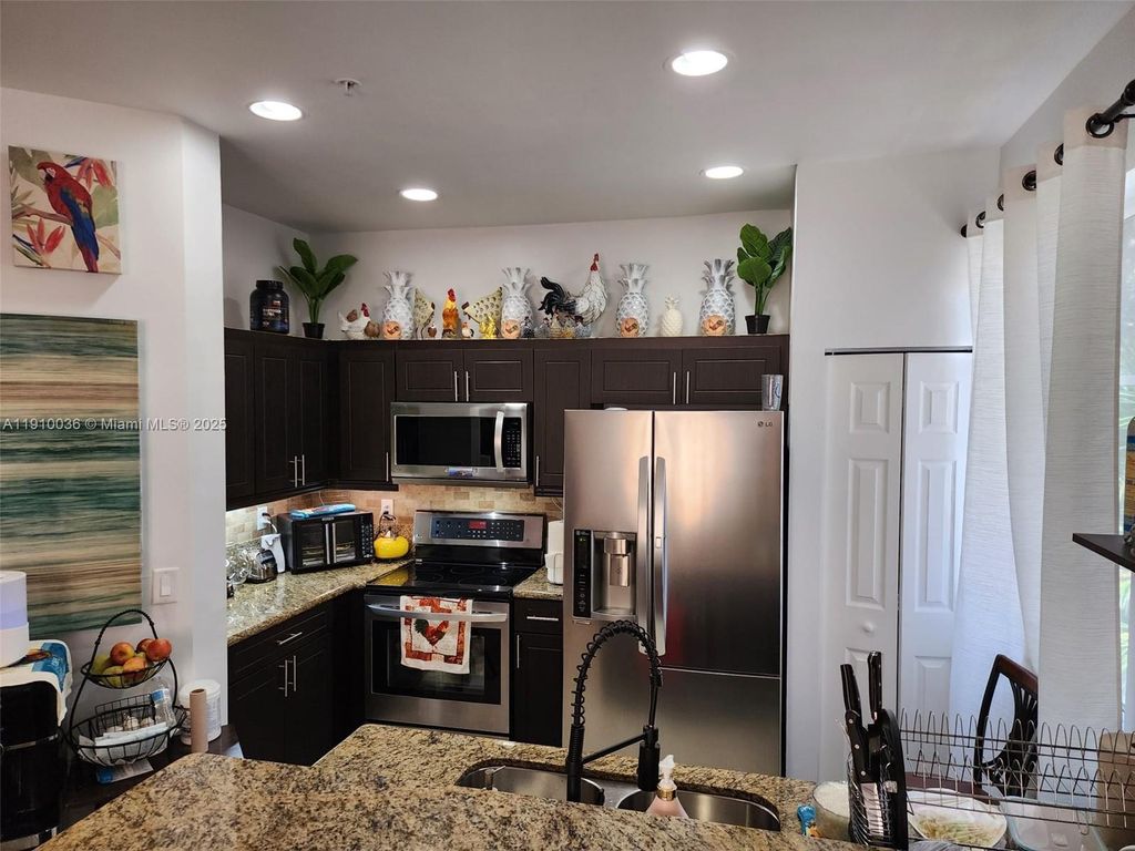 Photo of 12430 SW 50th St #147, Miramar, FL 33027 (MLS # A11910036)