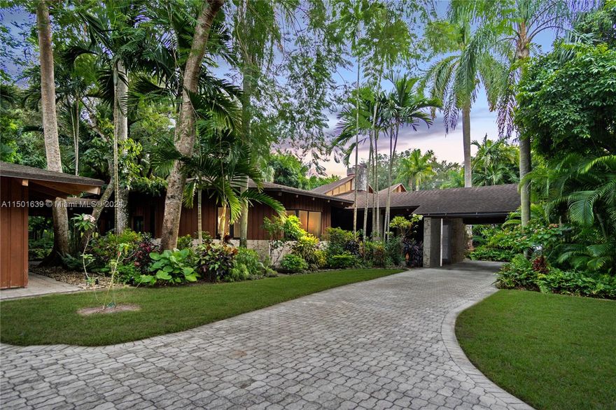 If you are looking for a private fortress, steps away from a big bustling city, you will find your retreat here in the trees. The Pinecrest Treehouse with its 1.6 acres at an impressive 70,000 square feet with 3,000 extra square feet of balcony, porches and Lanai space all enclosed and sharing the same roof making this 8,000 square feet of livable space. As you step into this amazing tree house, set your sights on high ceilings, unique architectural design and great coral rock finishes. Transport yourself to your private forest right in the heart of Miami. Think unique, resort-style and ski lodges. Let the picturesque windows, spacious balconies and natural light take your breath away. One person's dream can become another's masterpiece. Let your imagination take you to amazing heights.