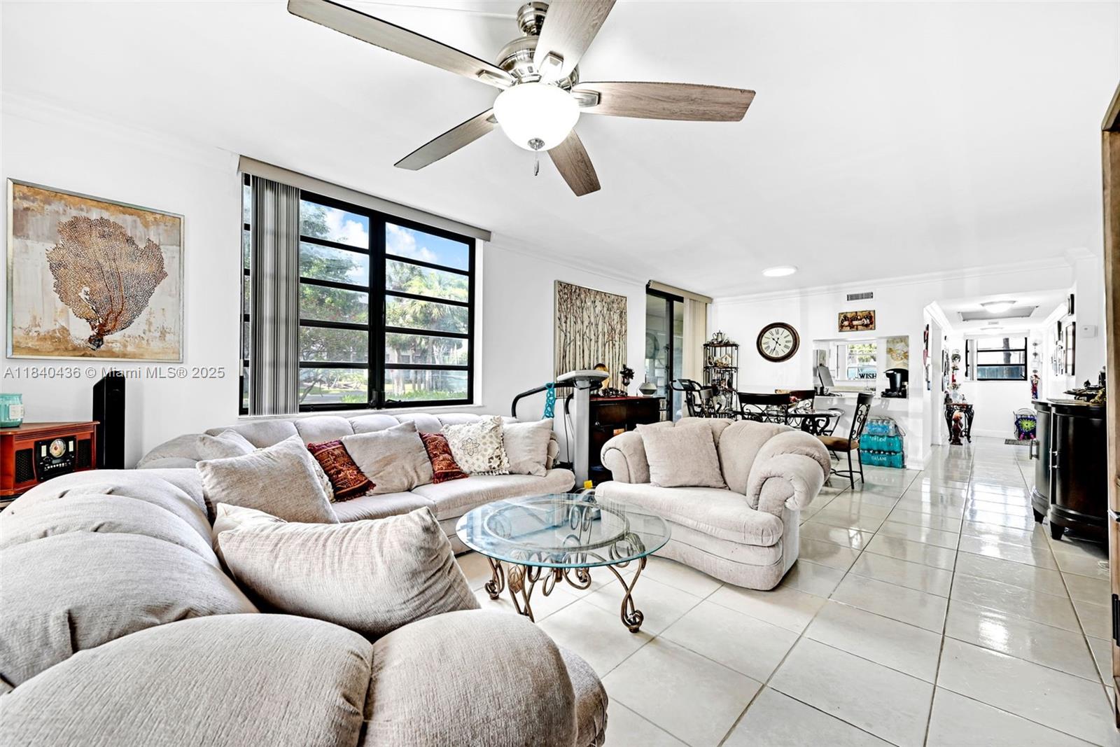 Welcome to Colony Point, a gated 55+ resort-style community in the heart of Pembroke Pines! This spacious and well maintained 2-bedroom, 2-bath condo peaceful lake and sunset views. Inside, enjoy an open layout with large bedrooms, walk-in closets, tile flooring, and a full-size washer and dryer. Resort style community amenities include a heated pool, jacuzzi, tennis & racquetball courts, shuffleboard, clubhouse, theater, billiards, sauna, walking paths, kayak dock, library, and shuttle service. HOA includes cable, internet, water, and more. Close to shopping, hospitals, restaurants, and major highways. Ready to move in and enjoy!