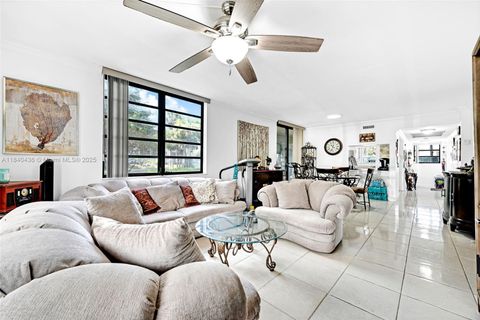 Photo of 1101 Colony Point Cir #123, Pembroke Pines, FL 33026 (MLS # A11840436)
