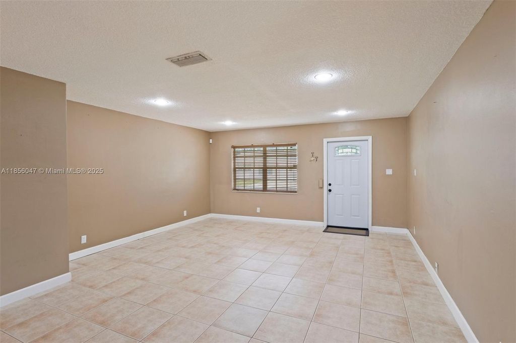 Photo of 7309 NW 60th St, Tamarac, FL 33321 (MLS # A11856047)