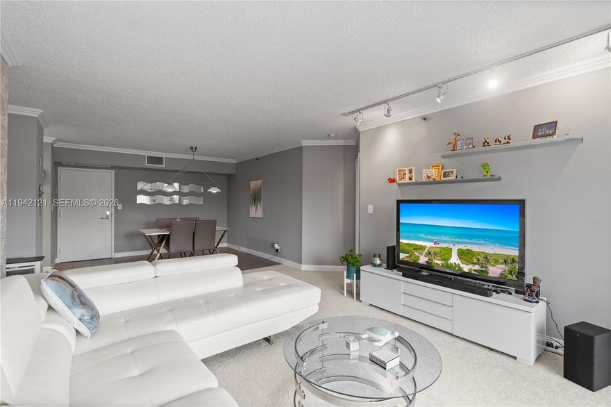 Welcome to a chic, beautifully remodeled 2-bedroom, 2-bath residence designed for effortless living and everyday enjoyment. Thoughtfully updated and impeccably maintained, this spacious condo offers a seamless blend of style, comfort, and functionality. Natural light fills the home, highlighting its well-designed layout and generous living spaces. An in-unit washer and dryer add convenience, while the overall flow creates a relaxed yet sophisticated atmosphere—perfect for both quiet mornings and entertaining guests. Ideal for low-floor living enthusiasts, the residence offers easy access and a true connection to the vibrant lifestyle just outside your door. The community elevates daily living with an exceptional array of amenities, including tennis, pickleball, and basketball courts, a fully equipped gym, on-site restaurant, optional marina for purchase or rent, mini market, dog park, and beautifully landscaped gardens that feel like a private retreat. All these complemented with EV charging stations, valet service, and 24/7 concierge. Adding peace of mind, the building is financially sound with ample reserves and has passed the milestone certification, making this not just a lifestyle upgrade, but a smart investment. A refined home, a resort-style environment—this is condo living at its best. Ideally located just minutes from Aventura Mall, beaches, and houses of worship, this residence delivers refined waterfront living with unmatched convenience.