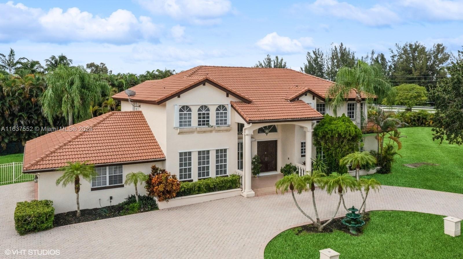 Corner lot 2-story, Plantation Acres, 6 bedrooms + office, 4-bathrooms, formal dining room, living room and family room that opens to spacious backyard/pool. Beautiful Mahogany Fireplace. The upstairs m/b suite has spacious walk-in closet, bathroom with double vanity sinks, bidet, separate shower and tub. Has access to the open balcony overlooking the backyard/pool. 2 bedrooms and 2 baths located on ground floor (perfect for In-Laws and or guests) Other features include oversized French Doors leading to the backyard, an oversized Mahogany wood front door and moldings, a three-car garage, laundry located in the garage, updated HVAC systems, and accordion and roll down shutters thru out. Easy access to I-595, I-75, Turnpike, SawGrass Express. SELLER MOTIVATED, MAKE OFFER!