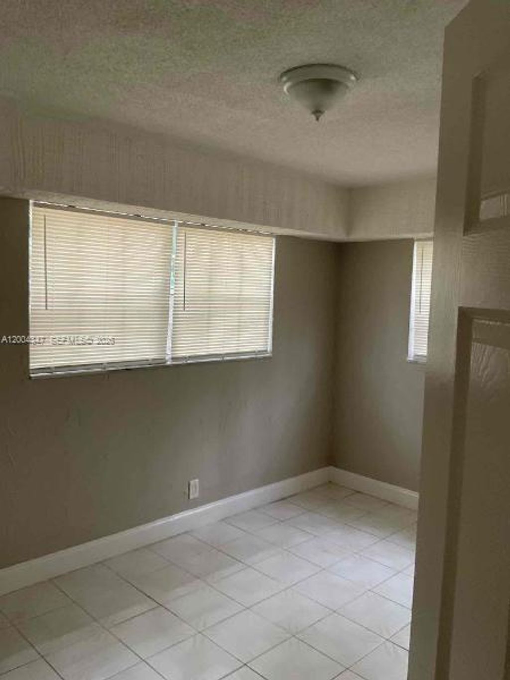 Photo of 1389 SW 24th Ave, Fort Lauderdale, FL 33312 (MLS # A12004347)