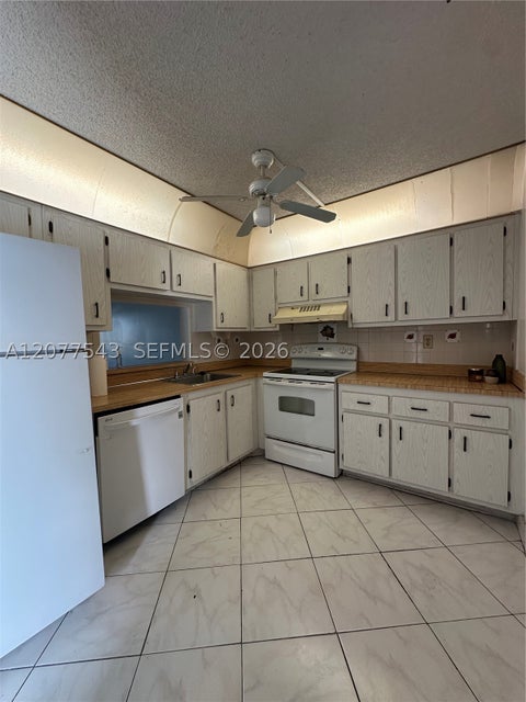 Photo of 1830 SW 81st Ave #4310, North Lauderdale, FL 33068 (MLS # A12077543)