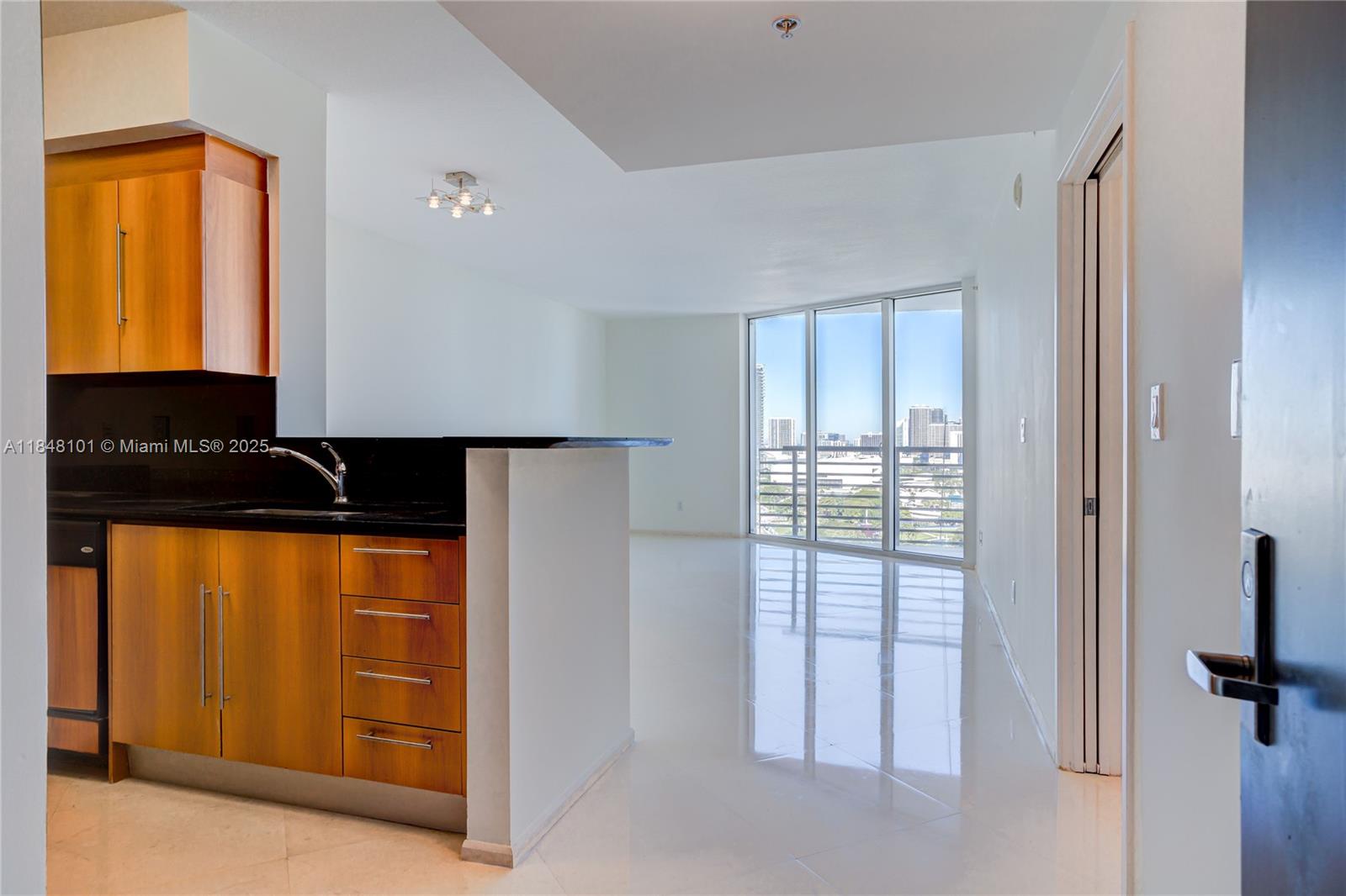Spacious and Fully renovated One-bedroom apartment at prestigious ONE Miami. Beautiful floor with Stunning Panoramic Water views of the Bayfront Park, Biscayne Bay, and Miami Skyline. NEW Terrazzo floors, custom LED lighting, and smooth ceiling throughout the unit. Magnificent open kitchen with Massive countertop, full-height pantry, and backsplash, large deep sink, with double depth wall, new appliances. Additional to the walk-in Closet, the Principal bedroom has a FULL wall of Closets! One Miami offers resort-style amenities including a pool,(under construction till October 2025) spa, fitness center, 24-hour concierge, valet, etc. Close to downtown, Bayfront Park, Whole Foods Supermarket,Cinema and More...